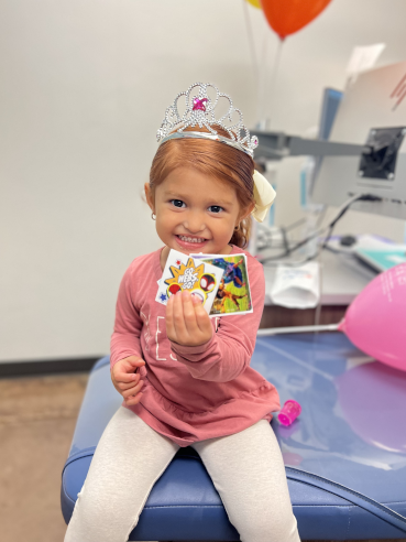 Happy Tupelo Patient with Prizes